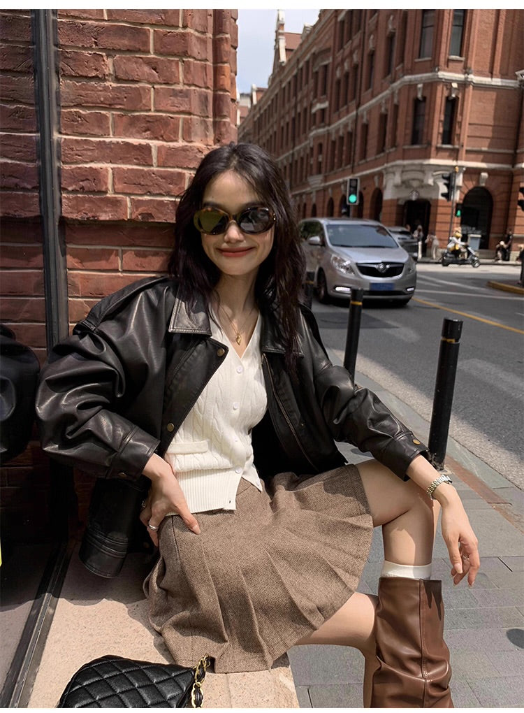 ケーブルニットベスト