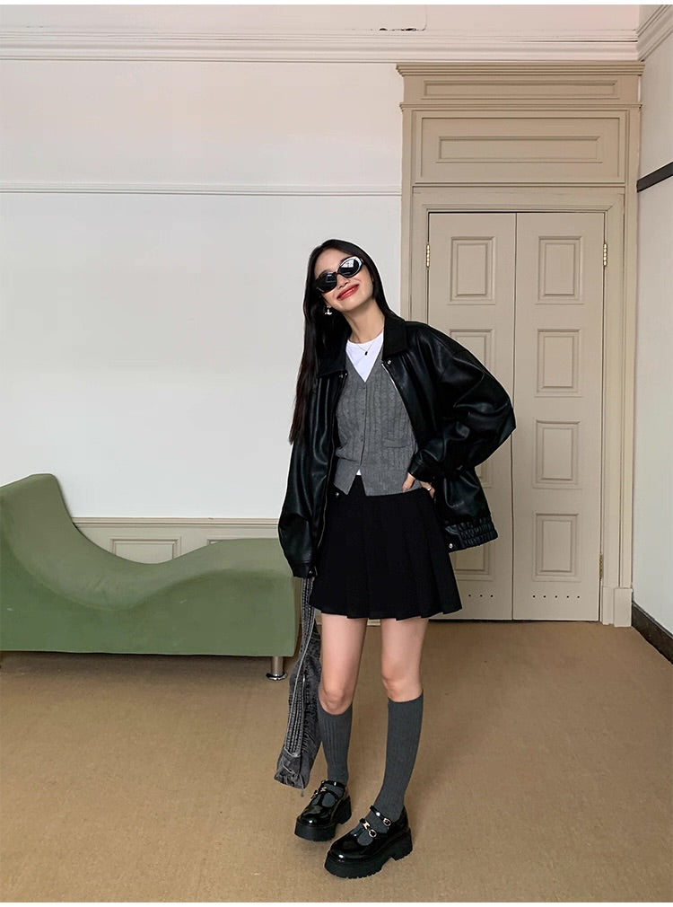 ケーブルニットベスト